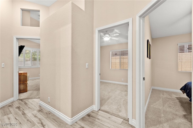 9733 Northern Dancer Dr, Las Vegas, NV 89117 - hall with baseboards and light wood-type flooring