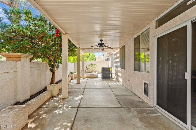 9733 Northern Dancer Dr, Las Vegas, NV 89117 - fenced backyard featuring ceiling fan and a patio area