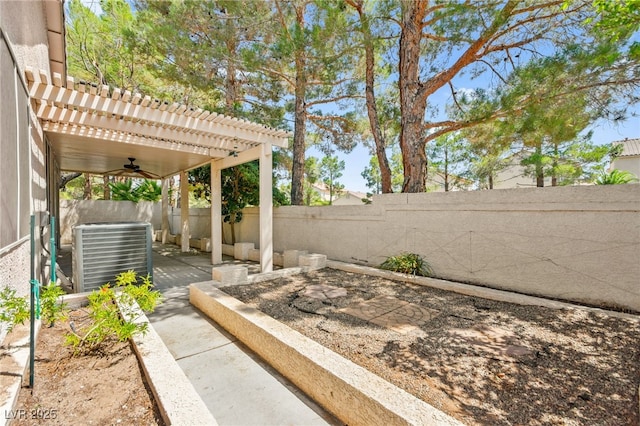 9733 Northern Dancer Dr, Las Vegas, NV 89117 - fenced backyard with a patio, a pergola, and ceiling fan