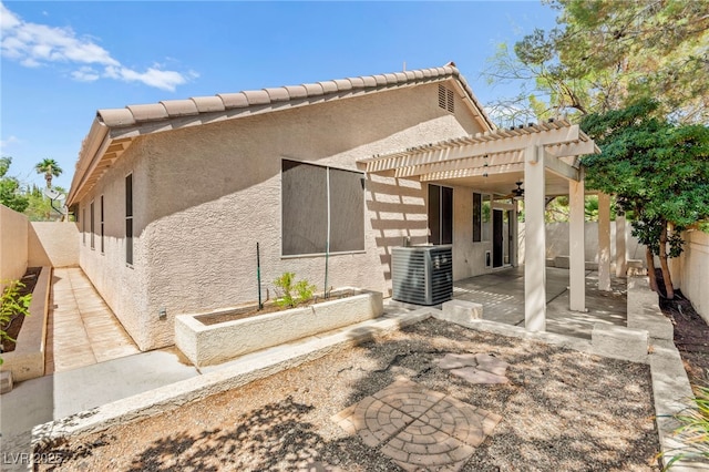 9733 Northern Dancer Dr, Las Vegas, NV 89117 - back of property with a fenced backyard, stucco siding, a patio, and a pergola