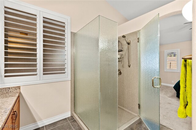 9733 Northern Dancer Dr, Las Vegas, NV 89117 - bathroom with a shower stall, vanity, and tile patterned flooring