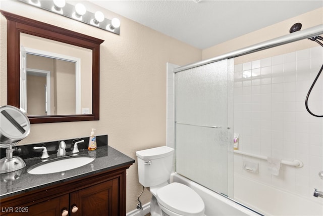 9733 Northern Dancer Dr, Las Vegas, NV 89117 - full bathroom featuring a textured wall, vanity, and enclosed tub / shower combo