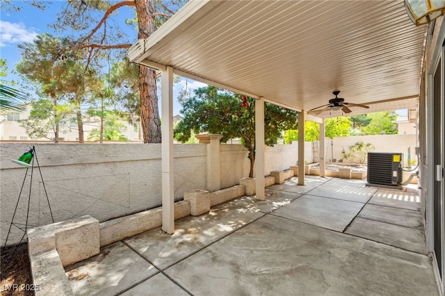 9733 Northern Dancer Dr, Las Vegas, NV 89117 - fenced backyard featuring a ceiling fan and a patio