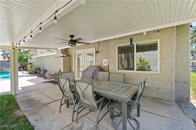 3361 Iberia St, Las Vegas, NV 89146 - view of patio featuring outdoor dining area, a ceiling fan, french doors, and area for grilling