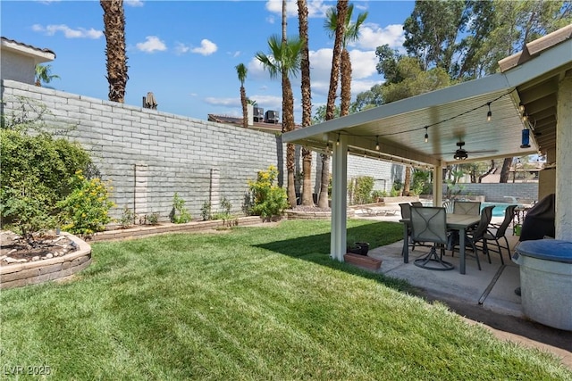 3361 Iberia St, Las Vegas, NV 89146 - fenced backyard with a patio and ceiling fan
