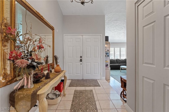 3361 Iberia St, Las Vegas, NV 89146 - foyer with light tile patterned flooring