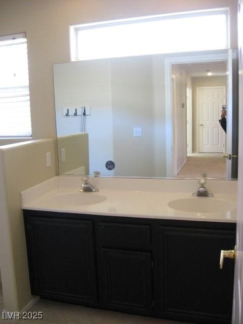254 Horizon Pointe Cir, Henderson, NV 89012 - full bathroom featuring double vanity and plenty of natural light