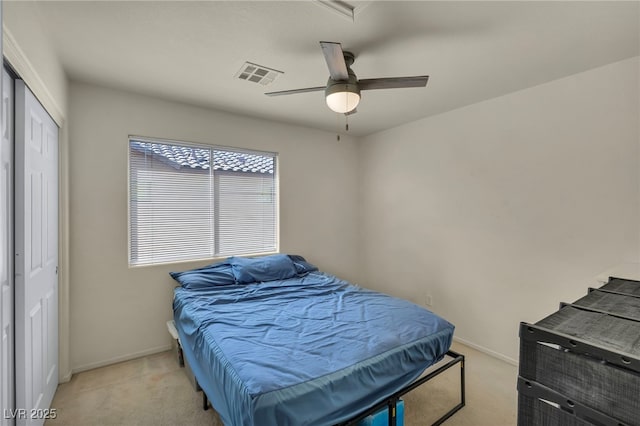 8421 Cheerful Brook Ave, Las Vegas, NV 89143 - bedroom featuring light colored carpet, a ceiling fan, and a closet