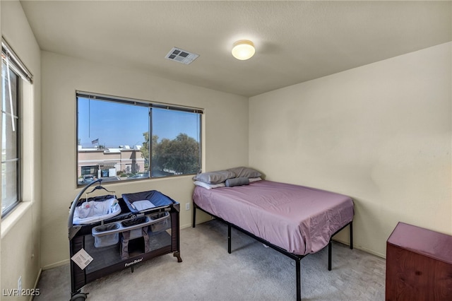 8421 Cheerful Brook Ave, Las Vegas, NV 89143 - bedroom with multiple windows and carpet