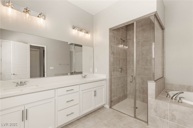 3391 Stone View Ave, Henderson, NV 89044 - bathroom with double vanity, a shower stall, a bath, and tile patterned flooring