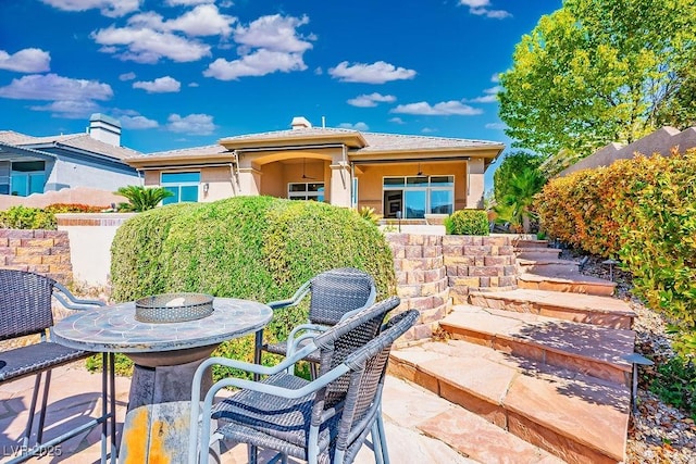 9233 Canyon Mesa Dr, Las Vegas, NV 89144 - rear view of property with a patio area and stucco siding