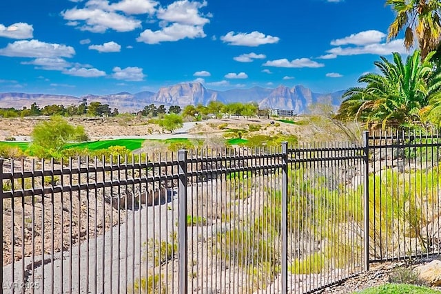 9233 Canyon Mesa Dr, Las Vegas, NV 89144 - gate featuring a water and mountain view