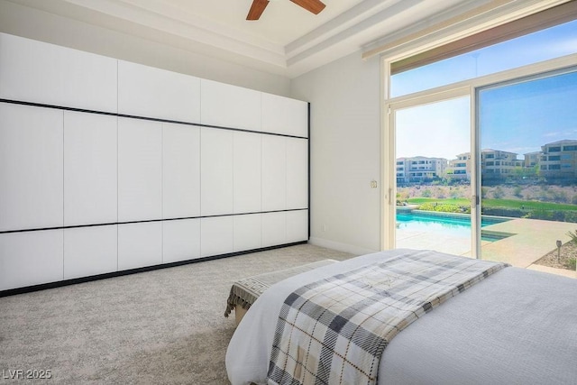 9233 Canyon Mesa Dr, Las Vegas, NV 89144 - carpeted bedroom with access to exterior, ceiling fan, and a raised ceiling