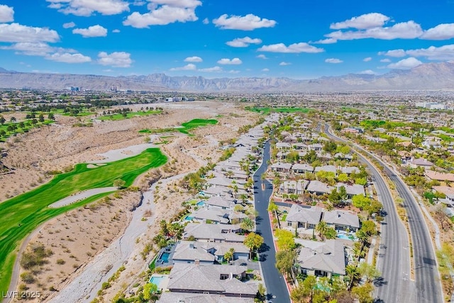 9233 Canyon Mesa Dr, Las Vegas, NV 89144 - aerial perspective of suburban area with a mountain backdrop and a golf club