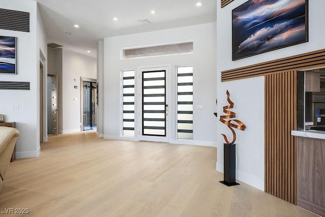 9233 Canyon Mesa Dr, Las Vegas, NV 89144 - foyer featuring light wood-type flooring and recessed lighting