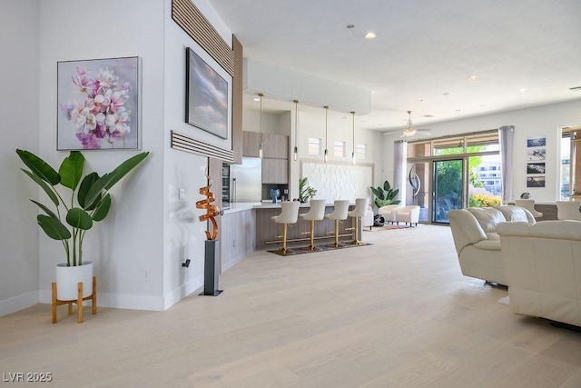 9233 Canyon Mesa Dr, Las Vegas, NV 89144 - living area featuring light wood-style floors, recessed lighting, and ceiling fan