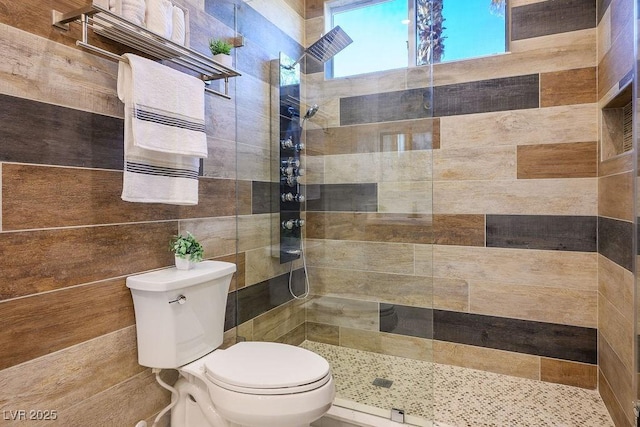 9233 Canyon Mesa Dr, Las Vegas, NV 89144 - bathroom featuring toilet and a tile shower