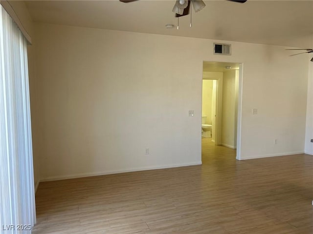 5650 E Sahara Ave Unit 2007, Las Vegas, NV 89142 - empty room with a ceiling fan and light wood-type flooring