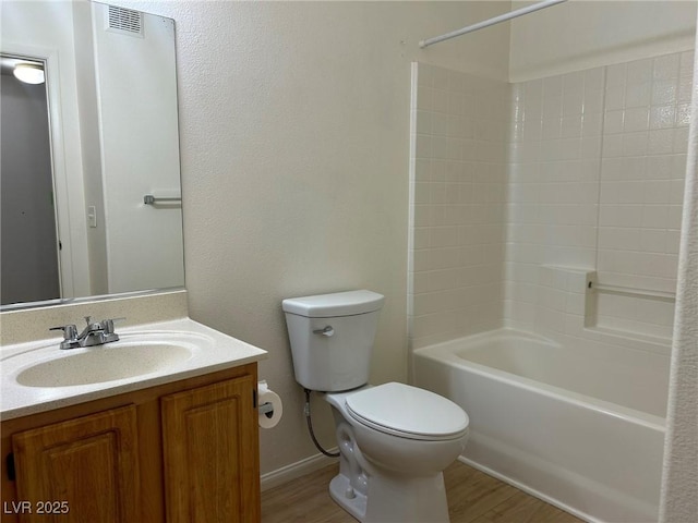 5650 E Sahara Ave Unit 2007, Las Vegas, NV 89142 - bathroom with vanity, washtub / shower combination, and wood finished floors