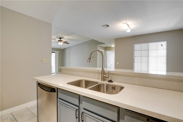 2633 S Durango Dr Unit 202, Las Vegas, NV 89117 - kitchen with dishwasher, ceiling fan, gray cabinets, and light stone countertops
