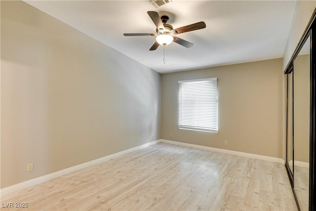 2633 S Durango Dr Unit 202, Las Vegas, NV 89117 - empty room featuring light wood-style floors and a ceiling fan