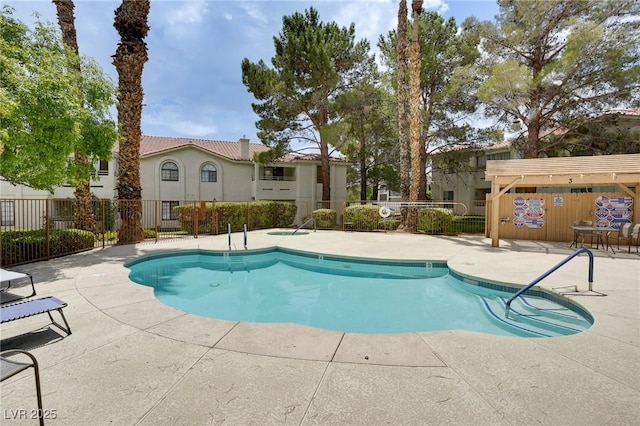 2633 S Durango Dr Unit 202, Las Vegas, NV 89117 - community pool with a patio area