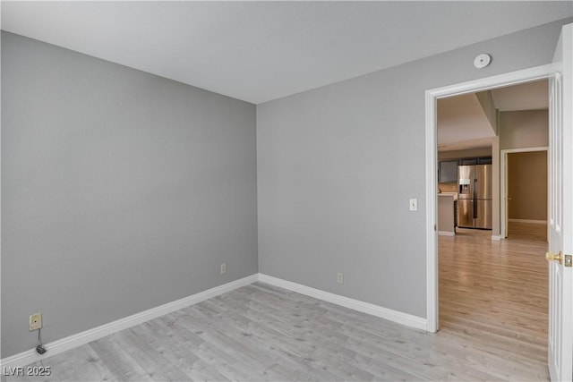 2633 S Durango Dr Unit 202, Las Vegas, NV 89117 - spare room with light wood finished floors and baseboards