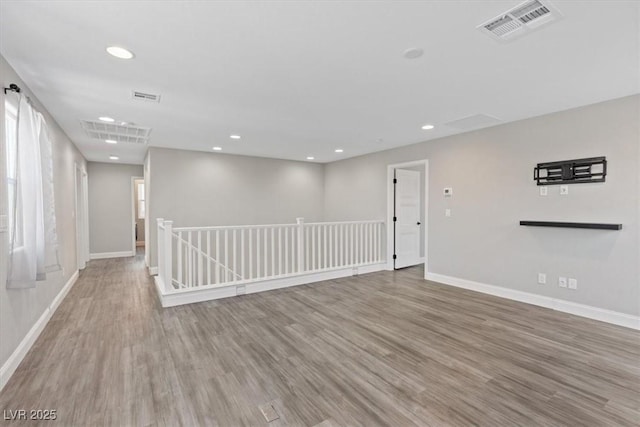 10058 Matter Overlook Dr, Las Vegas, NV 89178 - empty room with wood finished floors and recessed lighting