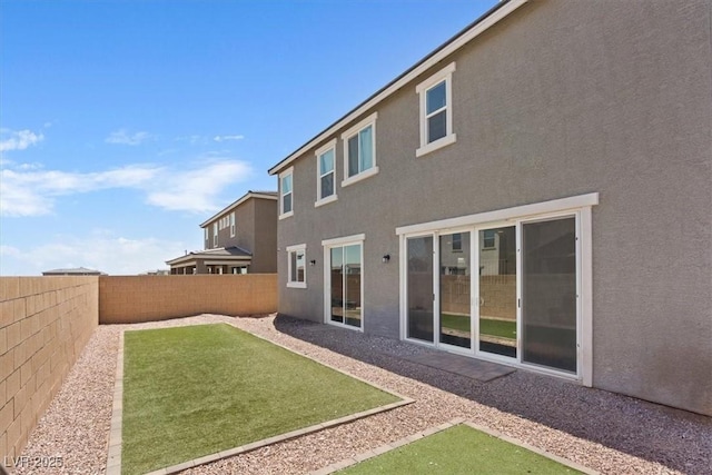 10058 Matter Overlook Dr, Las Vegas, NV 89178 - back of property featuring a fenced backyard and stucco siding