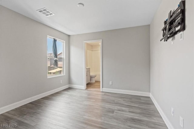 10058 Matter Overlook Dr, Las Vegas, NV 89178 - empty room with wood finished floors and baseboards