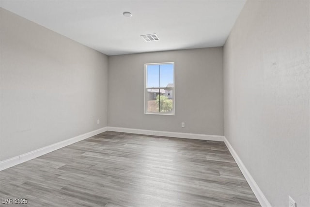 10058 Matter Overlook Dr, Las Vegas, NV 89178 - unfurnished room with wood finished floors