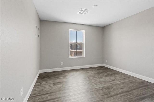 10058 Matter Overlook Dr, Las Vegas, NV 89178 - spare room featuring wood finished floors and baseboards