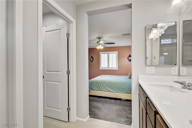 1113 Fragrant Cactus Ct, North Las Vegas, NV 89031 - bedroom with light tile patterned flooring, light carpet, and ceiling fan