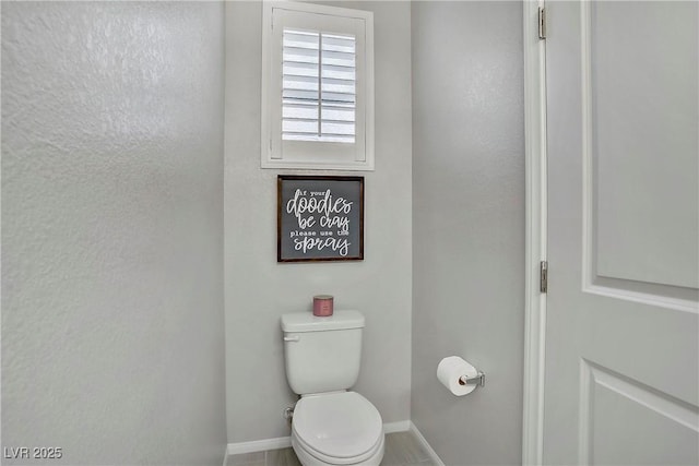 1113 Fragrant Cactus Ct, North Las Vegas, NV 89031 - bathroom with baseboards and toilet