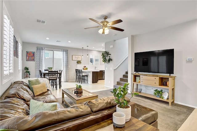 1113 Fragrant Cactus Ct, North Las Vegas, NV 89031 - living area with ceiling fan, stairway, and recessed lighting