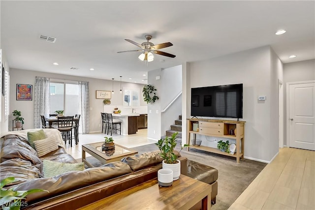 1113 Fragrant Cactus Ct, North Las Vegas, NV 89031 - living room featuring a ceiling fan, stairway, and recessed lighting
