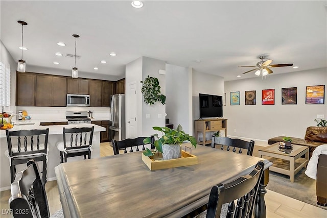 1113 Fragrant Cactus Ct, North Las Vegas, NV 89031 - dining area with recessed lighting and ceiling fan