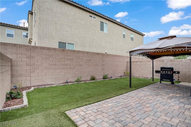 1113 Fragrant Cactus Ct, North Las Vegas, NV 89031 - fenced backyard featuring a gazebo, a patio, and grilling area