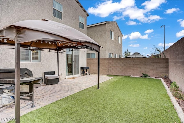 1113 Fragrant Cactus Ct, North Las Vegas, NV 89031 - fenced backyard featuring a gazebo and a patio