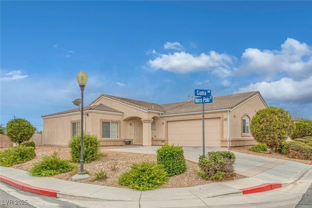 4713 Guma Way N, Las Vegas, NV 89031 - single story home featuring stucco siding, an attached garage, and concrete driveway
