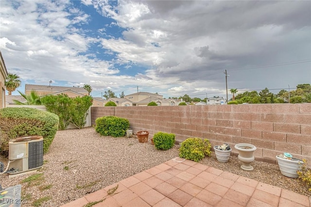4713 Guma Way N, Las Vegas, NV 89031 - fenced backyard with a patio area