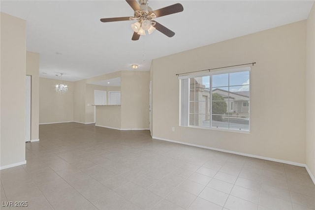 4713 Guma Way N, Las Vegas, NV 89031 - empty room with a ceiling fan and a chandelier