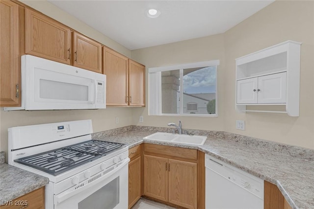 4713 Guma Way N, Las Vegas, NV 89031 - kitchen with white appliances and light countertops