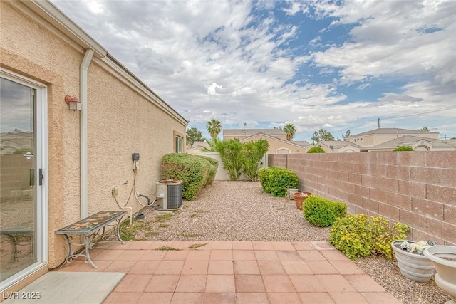 4713 Guma Way N, Las Vegas, NV 89031 - fenced backyard with a patio