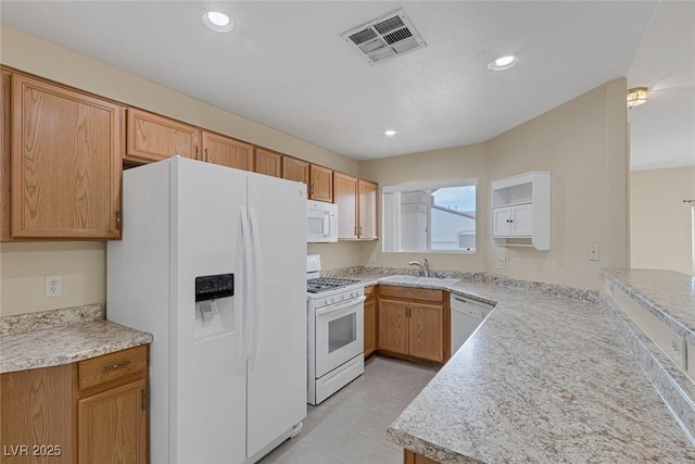 4713 Guma Way N, Las Vegas, NV 89031 - kitchen with white appliances, light countertops, and recessed lighting