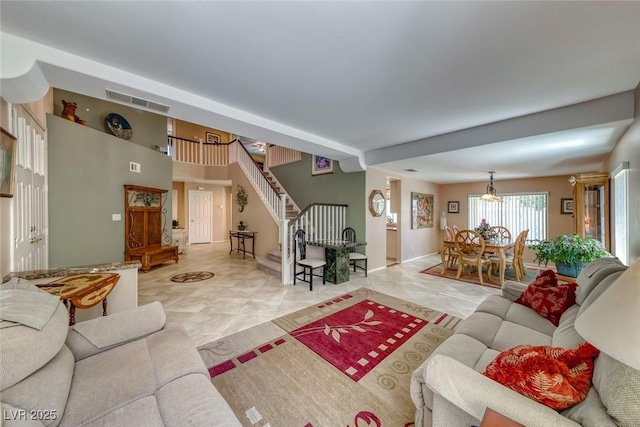 8914 Termoli St, Las Vegas, NV 89123 - living area with stairs and light tile patterned flooring