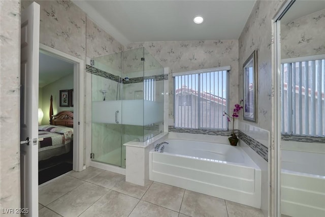8914 Termoli St, Las Vegas, NV 89123 - ensuite bathroom featuring wallpapered walls, a bath, a stall shower, and tile patterned flooring