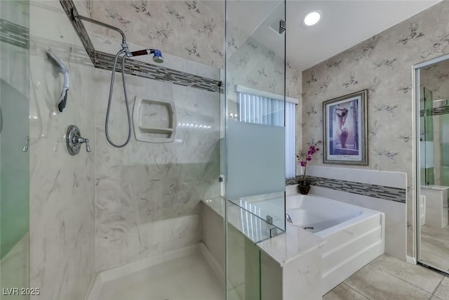 8914 Termoli St, Las Vegas, NV 89123 - bathroom featuring a marble finish shower, a garden tub, wallpapered walls, and tile patterned floors
