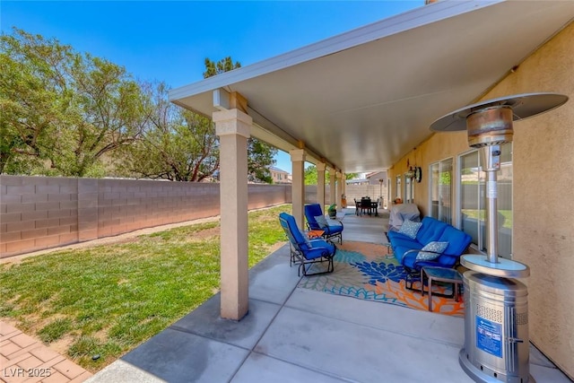 8914 Termoli St, Las Vegas, NV 89123 - fenced backyard featuring a patio and outdoor dining space