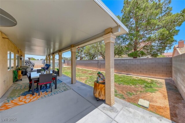 8914 Termoli St, Las Vegas, NV 89123 - fenced backyard featuring outdoor dining area and a patio